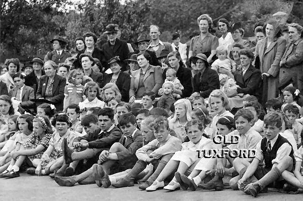 Right part of group watching an event in 1942