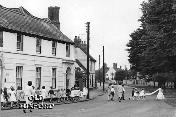 Procession beside the old doctor's surgery on Newcastle Street - 1966