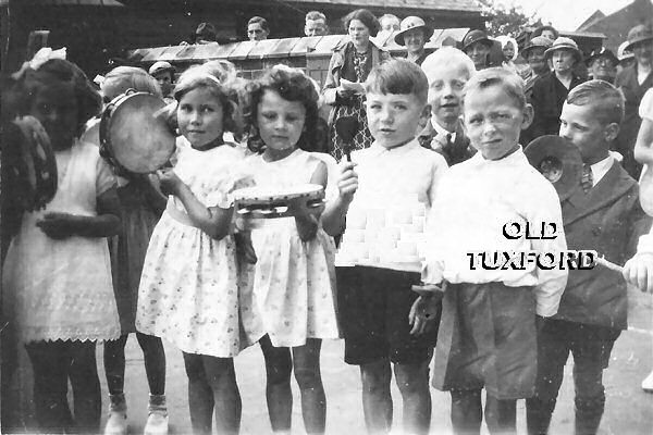 Infants playing music in the back playground