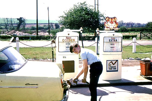 David Wayte filling a Ford Consul at the Esso petrol station in Ash Vale in the 1960s