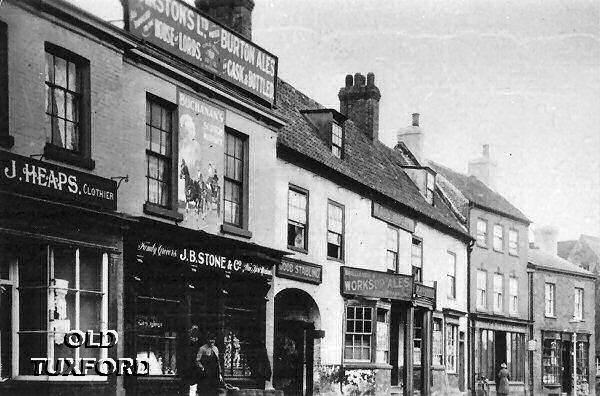 Looking down Eldon Street, shops and pubs