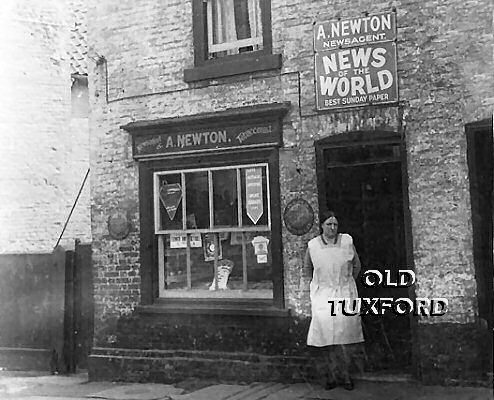 Mrs Newton outside her newsagents shop on Lincoln Road, now Halls