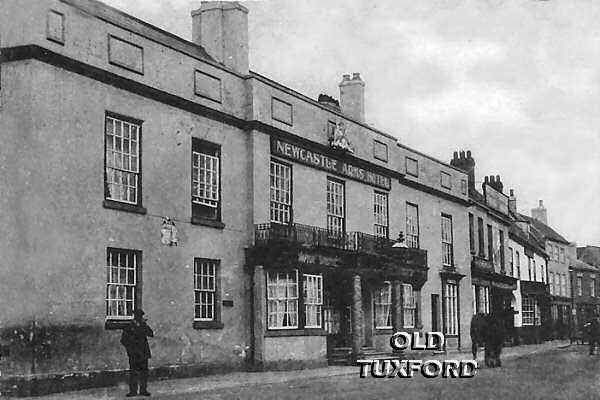 The Newcastle Arms Hotel, does anyone know who the man on the corner is?