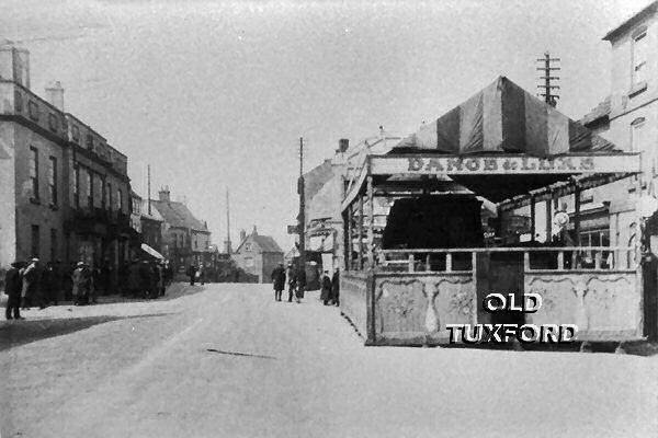 Rear of The Frivol - A fairground ride in front of Sanderson's Garage