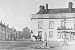 Village pump in the Market Place, horse in front of the Newcastle Arms Hotel