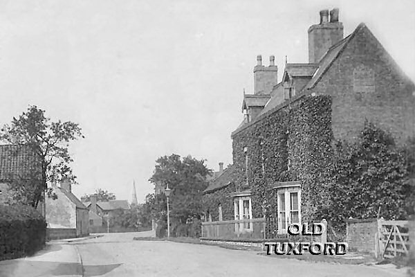 Looking up Newcastle Street, church spire in distance - Postcard stamped 1934