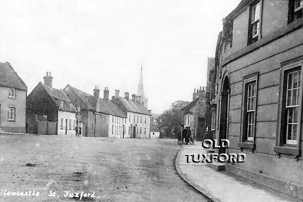 Looking up Newcastle Street with the old Doctor's surgery at right