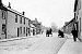 Looking down Newcastle Street from the Market Place, horse and carts