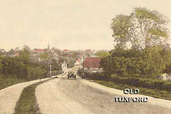 Open top car coming out of Tuxford - Postcard stamped 1926