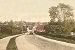 Open top car coming out of Tuxford - Postcard stamped 1926